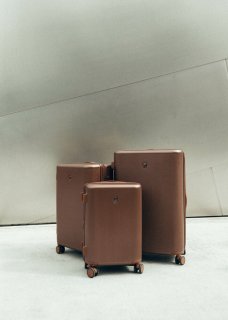 Большой чемодан Heys Earth Tones на 105/125 л весом 4,8 кг из поликарбоната Коричневый