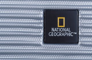 National Geographic Abroad 62 л чемодан из пластика на 4 колесах желтый