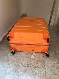 Середня 4-х колісна валіза із поліпропілену 67 л Travelite Nova, помаранчевий TL074048-87